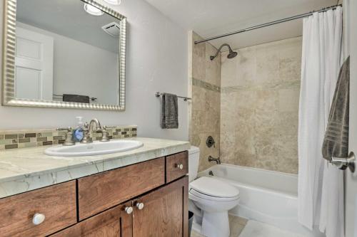 a bathroom with a sink and a toilet and a mirror at Eagle-Vail Gem Near Vail and Beaver Creek! in Dowds Junction