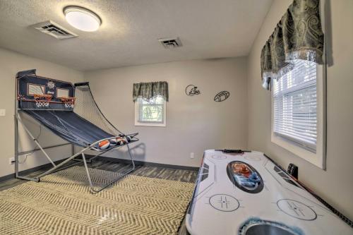 a childs room with a bed and a trampoline at Near Mines and Meadows Spacious Home with Game Room in Beaver Falls