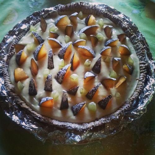 a cake with nuts on top of it on a table at Guest House I Vicini di Cesare in Castelnuovo