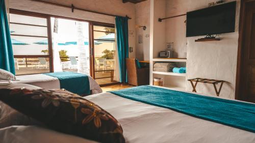 Postel nebo postele na pokoji v ubytování Isamar Hotel
