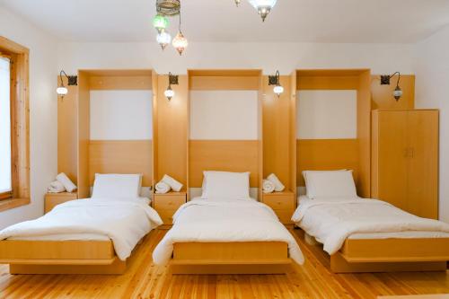 Postel nebo postele na pokoji v ubytování Natyral Razma Resort