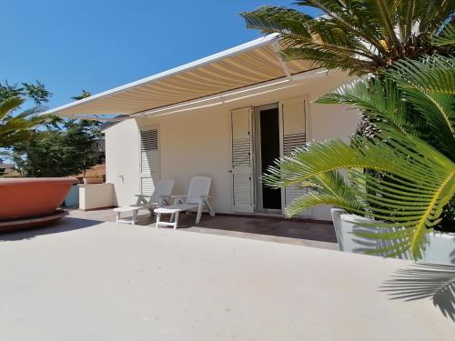 a villa with a view of a house at Casa Vacanze Villa Tropia in Camastra ex Solfara