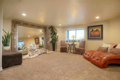 a living room with a zebra laying on the floor at Summit Villa BnB in Watkins