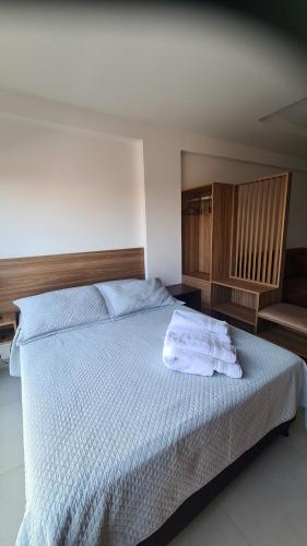 Postel nebo postele na pokoji v ubytování Práctico Smart Studio