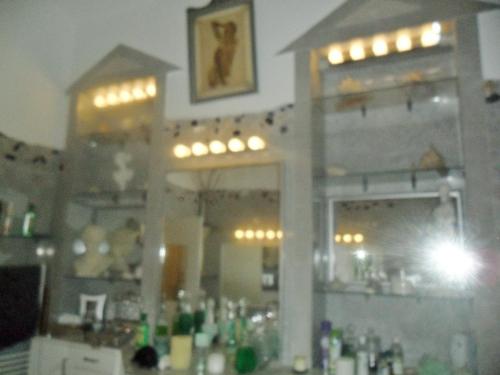 a kitchen with a counter with a lot of items at Luxury near Castle in Vienna