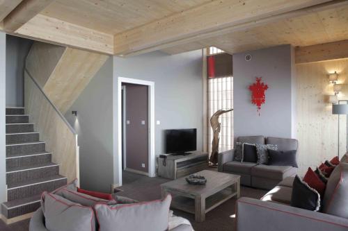 Et tv og/eller underholdning på L'Aiguille Grive Chalets Hotel