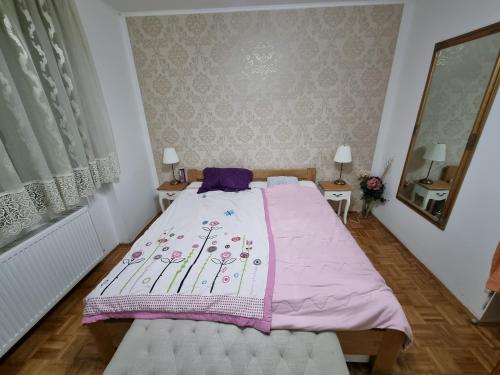 מיטה או מיטות בחדר ב-Apartman Danijela