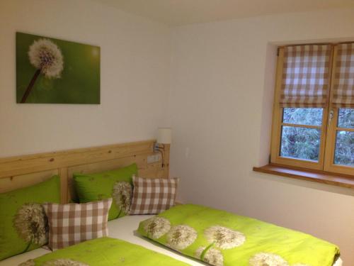 Ένα ή περισσότερα κρεβάτια σε δωμάτιο στο MountainLodge Dorfhaus