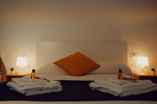 Uma cama ou camas num quarto em Casa Navì - Typical house by Navigli