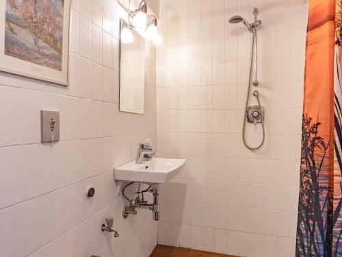a bathroom with a sink and a shower at 4 person holiday home in Faaborg-By Traum in Bøjden