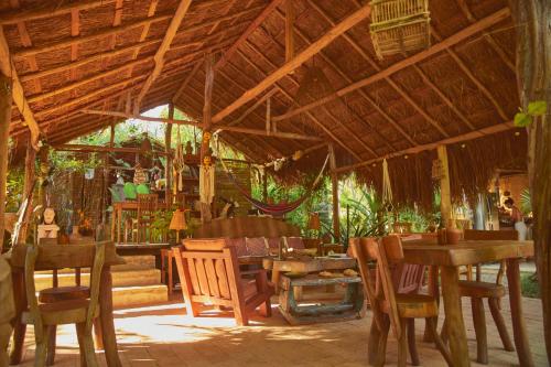 Um restaurante ou outro lugar para comer em Pousada Peixe do Mato