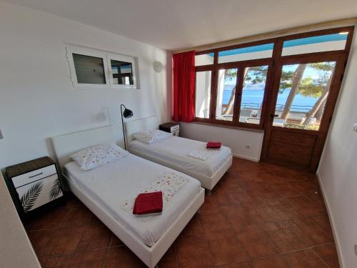 Postel nebo postele na pokoji v ubytování Apartment Mimice 2972a