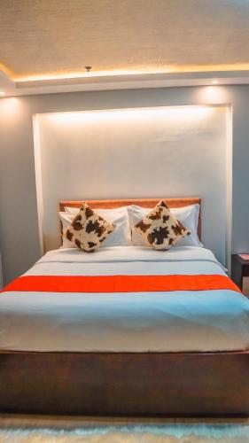 Aya Hotel & Residencesにあるベッド