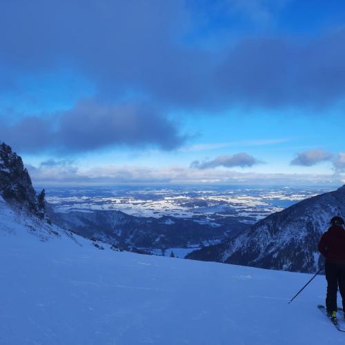 a person is skiing down a snow covered mountain at Ferienhaus Carmen in Grän