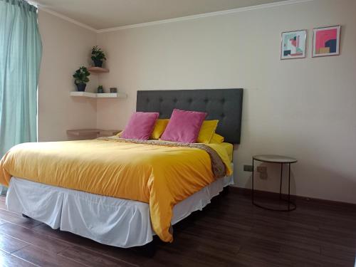Cama o camas de una habitación en Agustinas Apartments