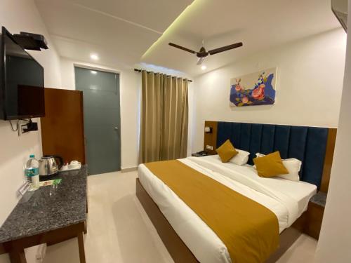 Cama o camas de una habitación en Hotel Shiva Yog Sthal