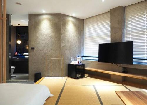 TV a/nebo společenská místnost v ubytování 小小邸 Small Hotel