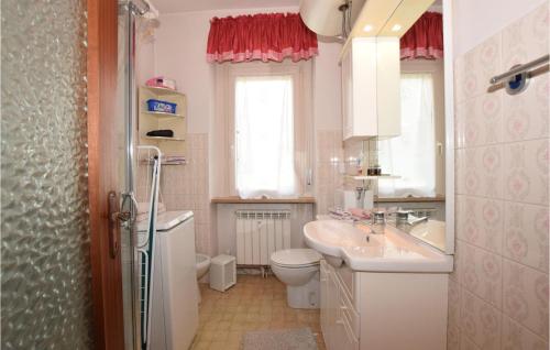 a bathroom with a sink and a toilet at Nice Apartment In Chatillon With Wifi in Châtillon