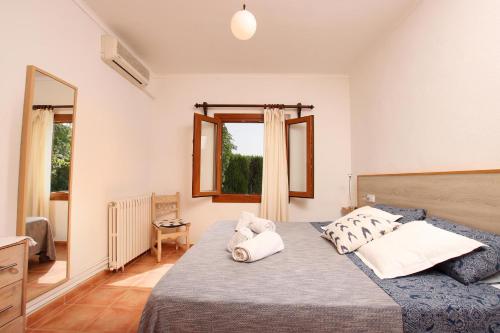 Postel nebo postele na pokoji v ubytování Villa PROVENZAL PETIT - PROVENZA