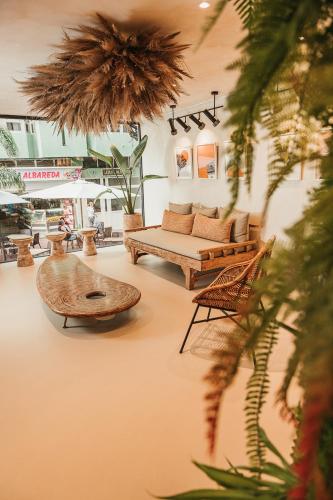 a living room with a couch and a coffee table at Hotel Aloe Canteras in Las Palmas de Gran Canaria