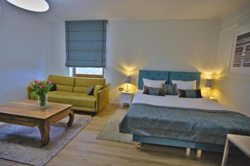 Posteľ alebo postele v izbe v ubytovaní Hotel i Restauracja na Skarpie
