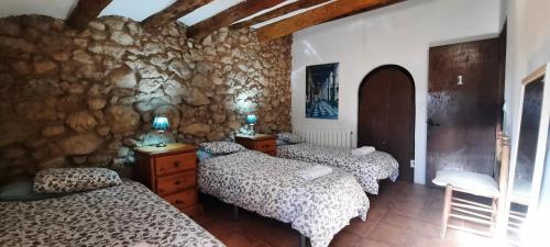 Cama o camas de una habitación en Cal Pau Cruset