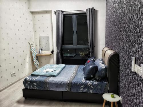 Katil atau katil-katil dalam bilik di MsHome Suite Equnie Residence @ Taman Equnie Seri Kembangan