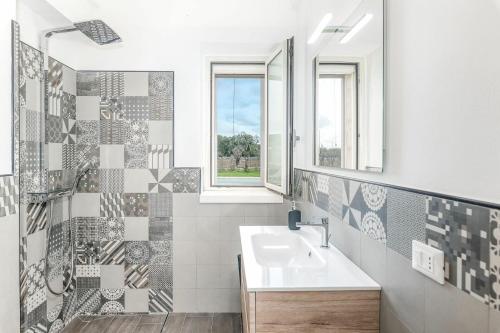 Kúpeľňa v ubytovaní Villa Trullina by Raro Villas