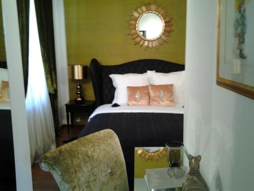 Una cama o camas en una habitación de Vila Siam - adults only holiday retreat