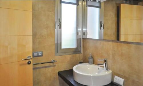 a bathroom with a sink and a mirror at Villa en Almuñecar in Almuñécar