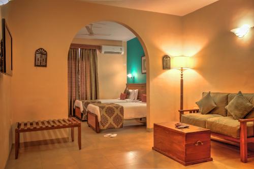 Katil atau katil-katil dalam bilik di Pride Sun Village Resort & Spa