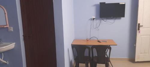 TV/Unterhaltungsangebot in der Unterkunft B & B Konni, Pathanamthitta