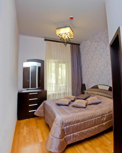Postel nebo postele na pokoji v ubytování Aya Maria Wellness SPA Resort