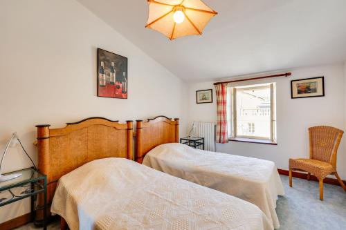 Maison de 3 chambres avec piscine partagee terrasse amenagee et wifi a Lagrasse tesisinde bir odada yatak veya yataklar