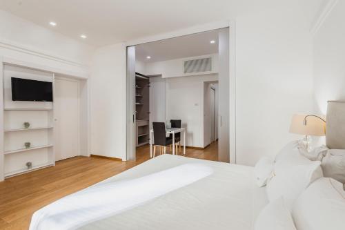 Postel nebo postele na pokoji v ubytování RG7 Apartments