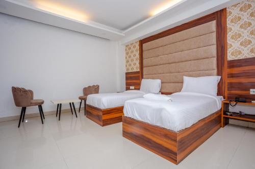 Posteľ alebo postele v izbe v ubytovaní HOTEL DOON