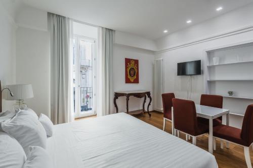 Postel nebo postele na pokoji v ubytování RG7 Apartments