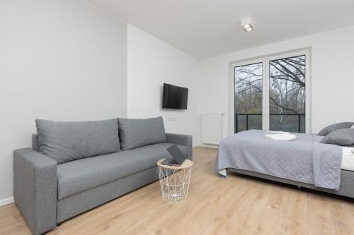 Χώρος καθιστικού στο Metro Bielany Apartments with Parking by Noclegi Renters