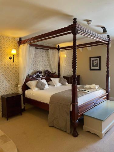 Ένα ή περισσότερα κρεβάτια σε δωμάτιο στο The George Inn