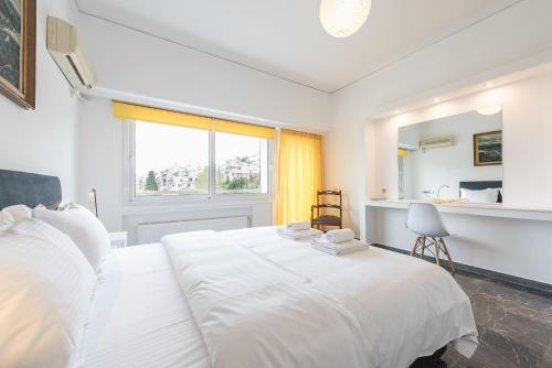Posteľ alebo postele v izbe v ubytovaní Luxury Penthouse in Kolonaki with view