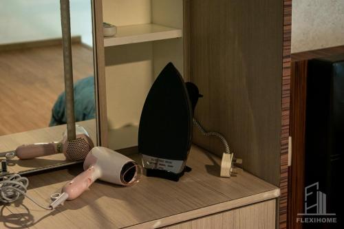 a counter top with a knife and a mirror at NETFLIX-Pinnacle PJ, Fantastic City View, 1-6 Guests Designed Duplex Home by Flexihome-MY in Petaling Jaya