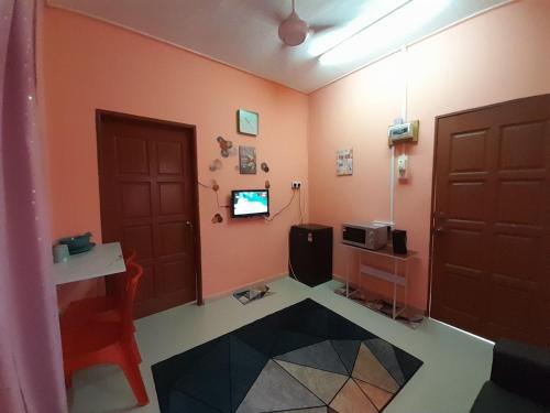 Televisyen dan/atau pusat hiburan di GUESTHOUSE MOKTEH