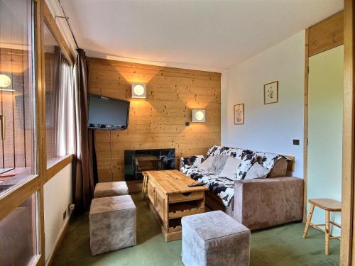 Coin salon dans l'établissement Appartement Belle Plagne, 4 pièces, 8 personnes - FR-1-455-2