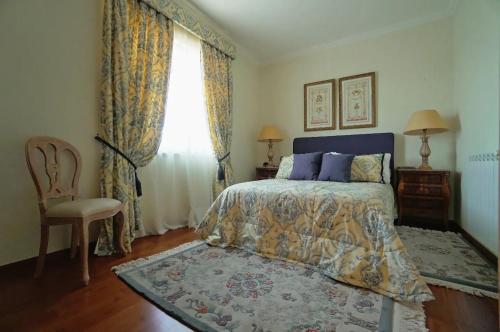 Postel nebo postele na pokoji v ubytování Rocha's House - Setúbal