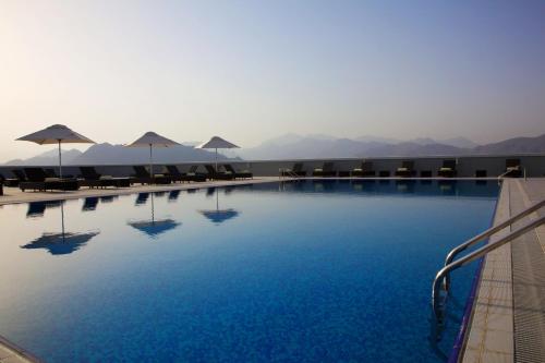 Bazén v ubytovaní Concorde Hotel - Fujairah alebo v jeho blízkosti