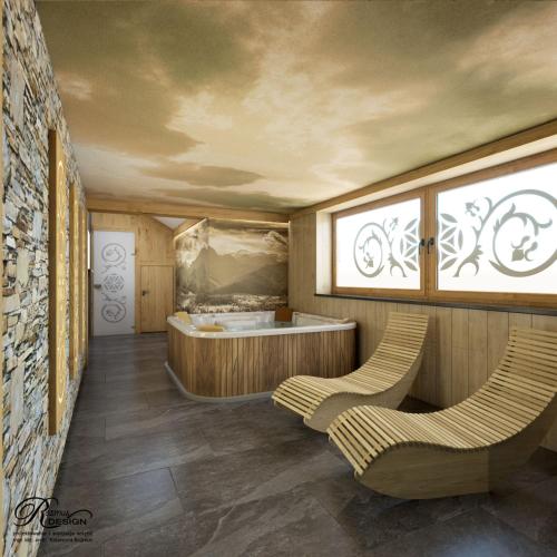 a bathroom with two chairs and a tub at Willa Dziubas z jacuzzi & sauną in Małe Ciche