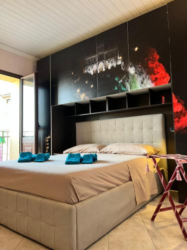 Postel nebo postele na pokoji v ubytování Appartamento Tropheum