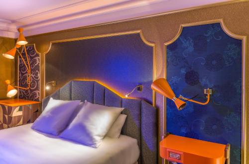 Ένα ή περισσότερα κρεβάτια σε δωμάτιο στο Idol Hotel