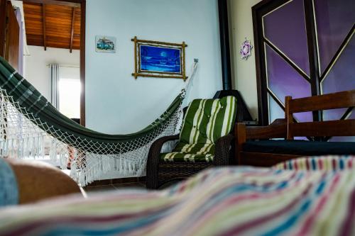 Katil atau katil-katil dalam bilik di Mozamba Surf House
