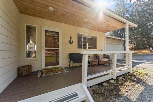 a front porch of a house with a wooden roof at Blue Lake Serenity in Hollywood Beach